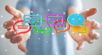 Businessman using digital colorful 3D rendering conversation icons