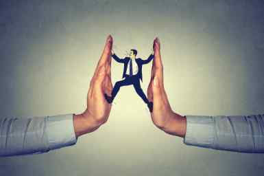 man between hands resisting pressure